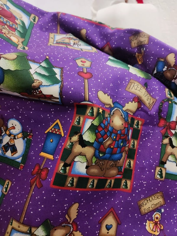 1/2 metro de tela de algodón Renos y Hombres de Nieve en púrpura vintage